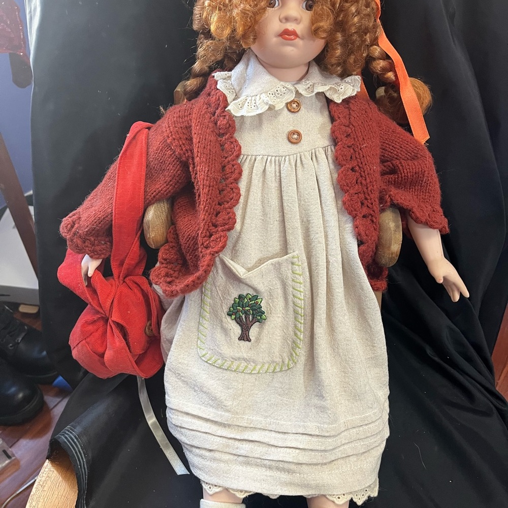 Charming Red and Cream China Doll with Embroidered Dress